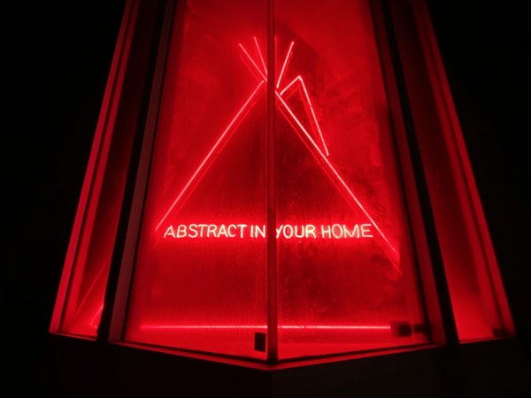 A neon sign artwork in red.