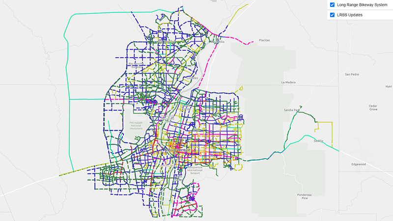 A long range bikeway map screenshot showing routes across the greater Albuquerque metro area, including Rio Rancho, Bernalillo, and Los Lunas.